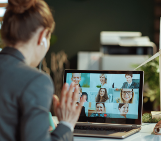 women at computer on remote meeting